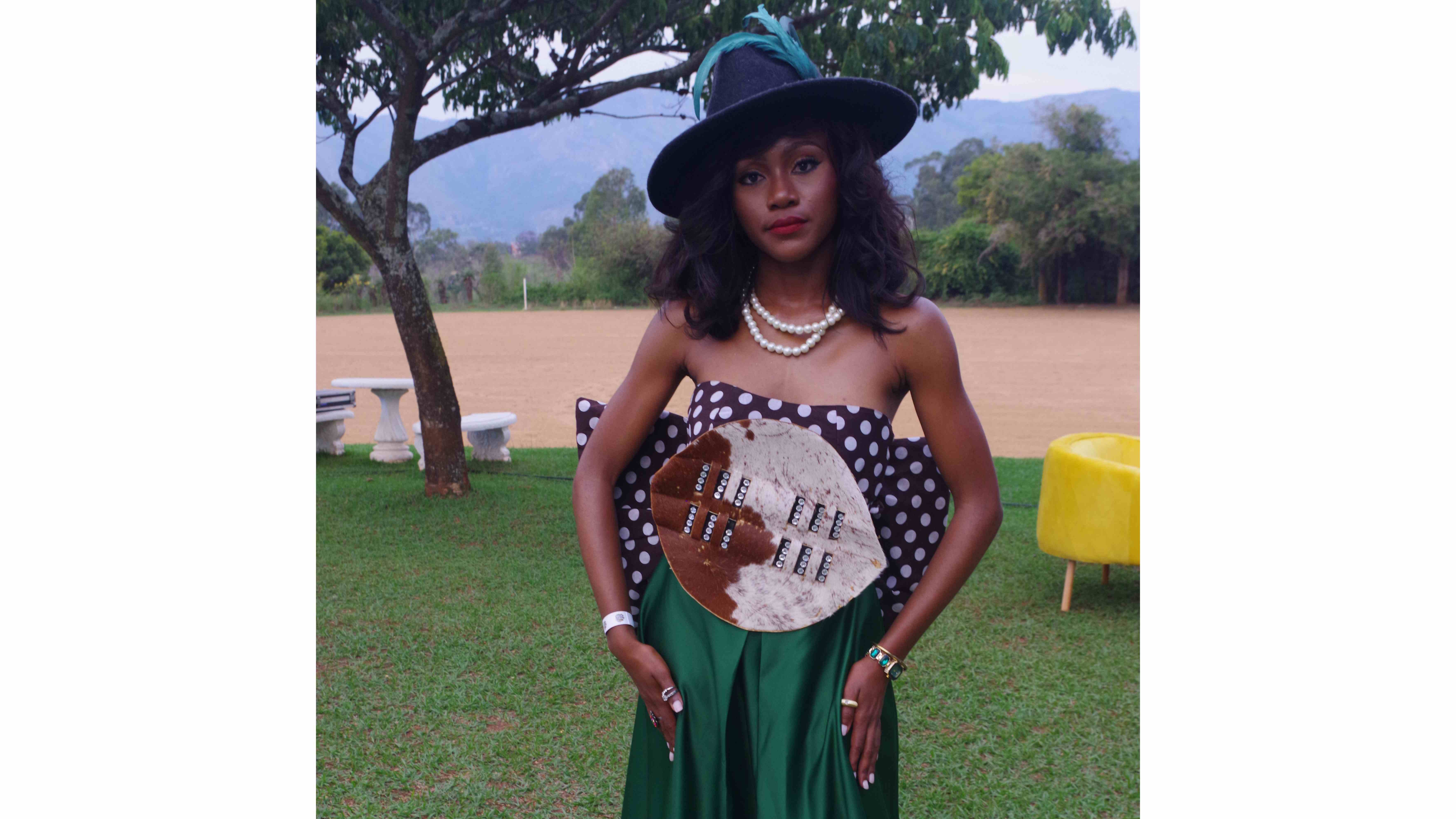 Masentle Dlamini pulled out a green and brown polka dot outfit. She uplifted the look with a ‘lihawu’ for a touch of Swati flair in the outfit.
